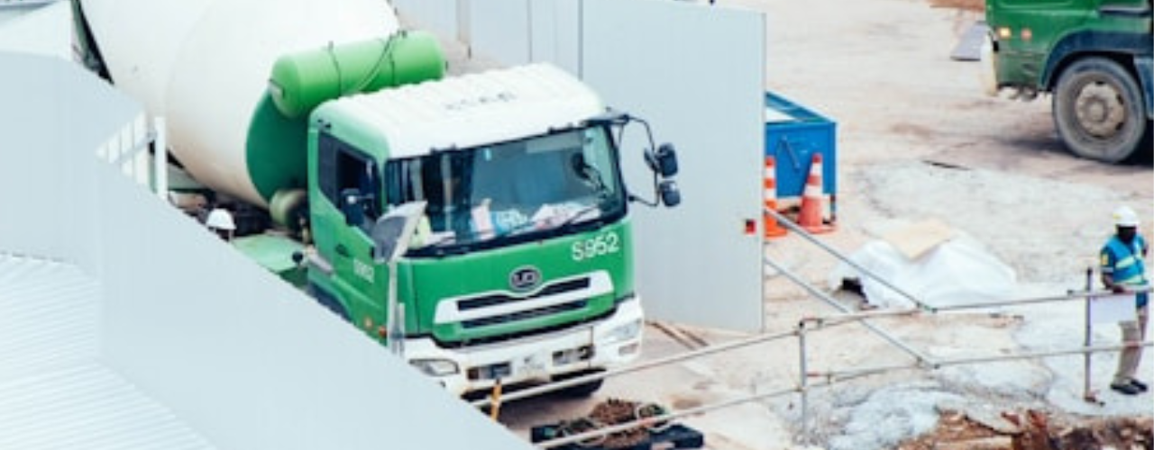 An image of a truck coming into a construction site