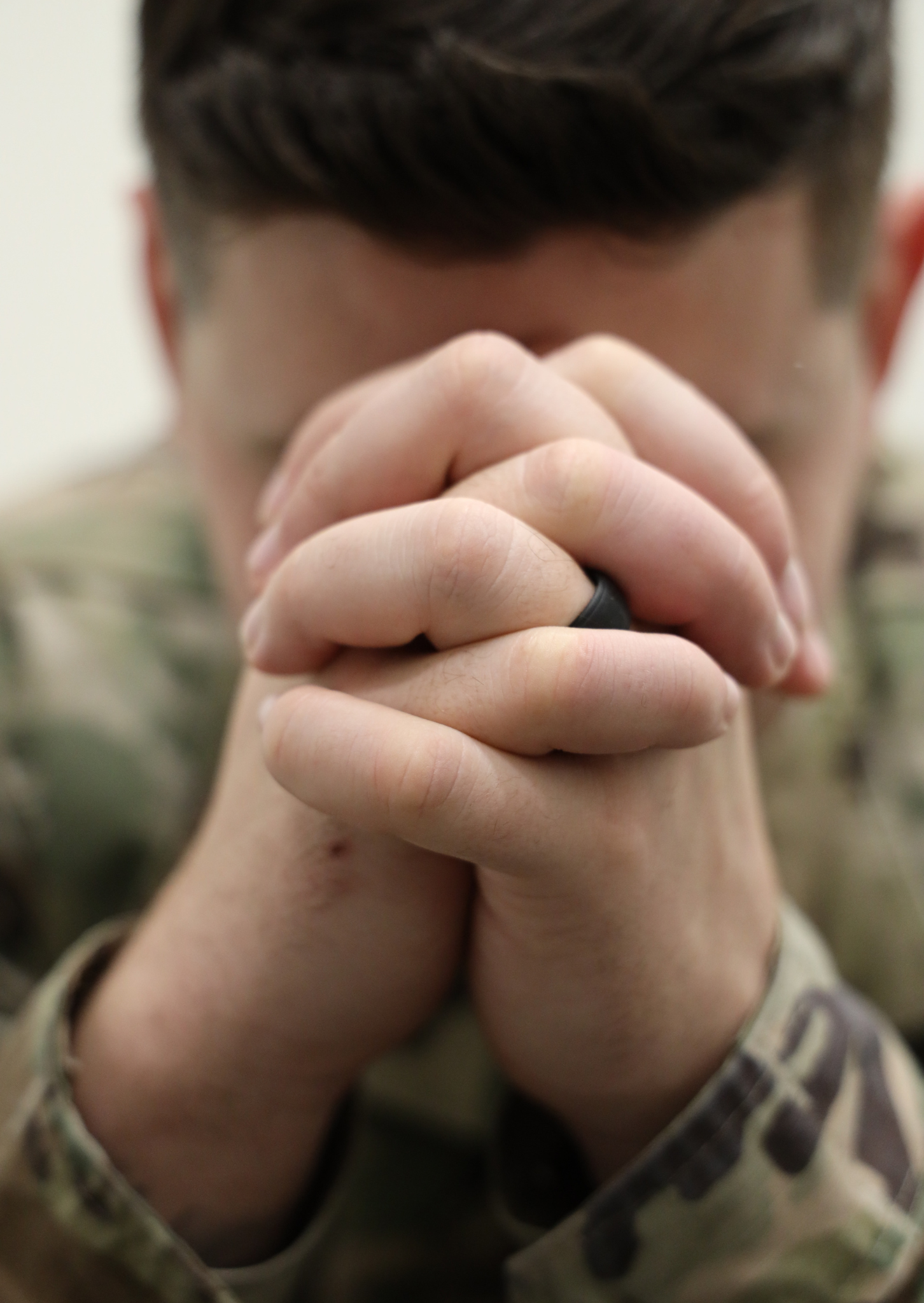 a soldier praying